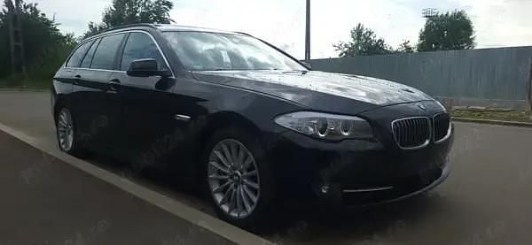 Negru Utilizat 2012 BMW 2000 Berlinǎ | 7.900 EUR - Imagine 1/4