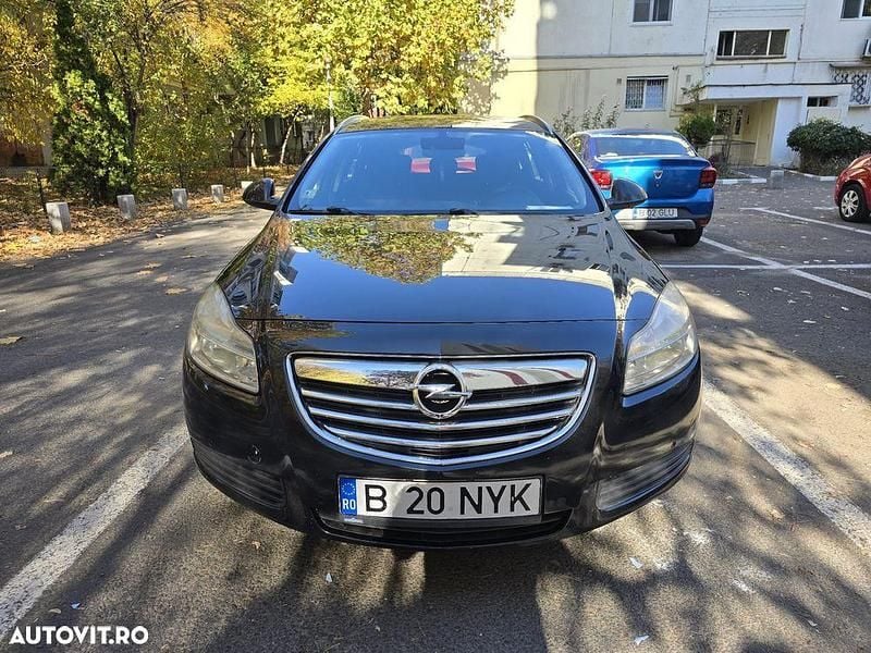 Culoarenegru Utilizat 2011 Opel Insignia Break | 3.999 EUR (Preț OK) - Imagine 1/4