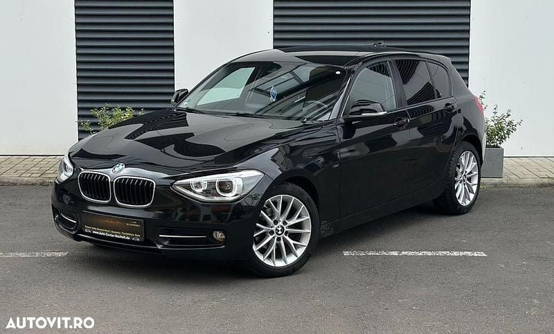 Culoarenegru Utilizat 2011 BMW 118 Sport Line Hatchback | 6.990 EUR (Preț bun) - Imagine 1/4