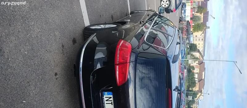 Second-hand VW Passat Comfortline 140 CP (102 kW) 2011 Negru Break