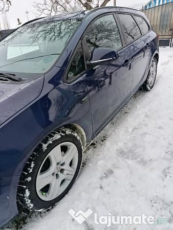 Second-hand Opel Astra 110 CP (80 kW) 2011 Albastru Break