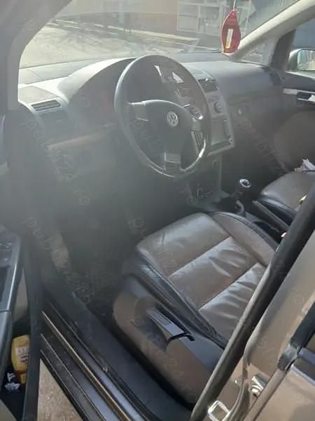 Second-hand VW Touran 170 CP (125 kW) 2009 Monovolum