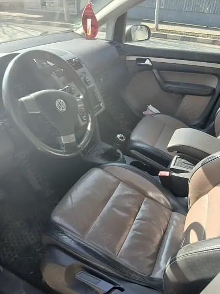 Second-hand VW Touran 170 CP (125 kW) 2009 Monovolum