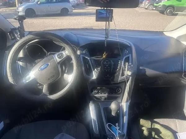 Second-hand Ford Focus 130 CP (95 kW) 2014 Argintiu Berlinǎ