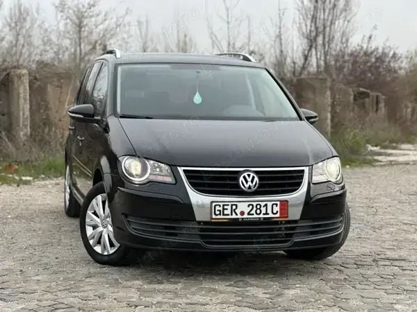 Negru Utilizat 2010 VW Touran Freestyle Monovolum | 4.190 EUR (Preț OK) - Imagine 1/4