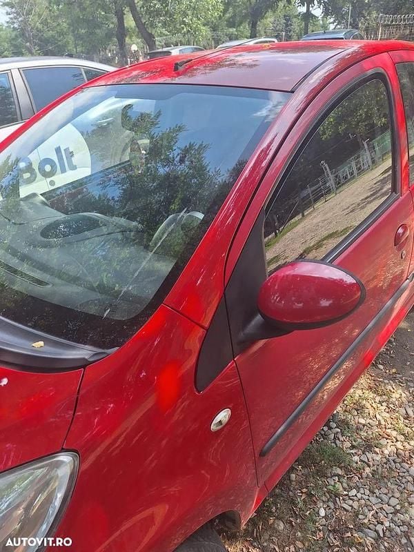 Second-hand Peugeot 107 68 CP (50 kW) 2007 Rosu Hatchback