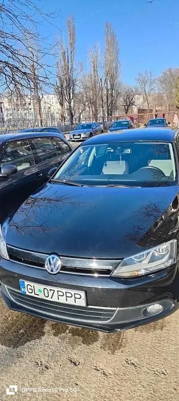 Utilizat 2014 VW Jetta Hybrid Berlinǎ | 6.400 EUR - Imagine 1/4