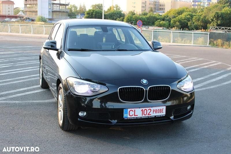 Negru Utilizat 2014 BMW 120 Sport Line Hatchback | 7.399 EUR - Imagine 1/4