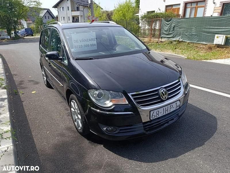 Second-hand VW Touran Highline 140 CP (102 kW) 2009 Culoarenegru Monovolum
