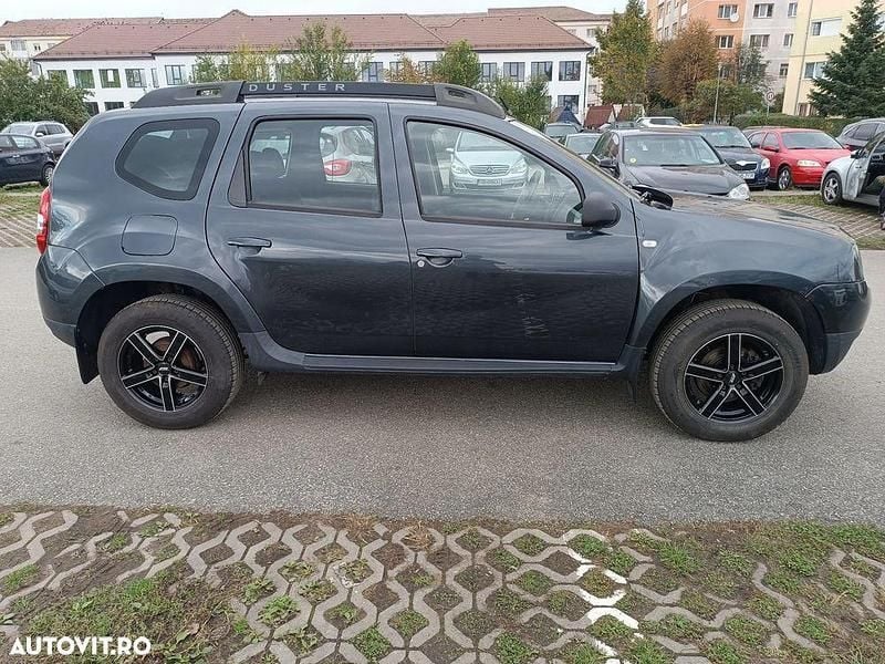 Gri Utilizat 2015 Dacia Duster Lauréate SUV | 8.500 EUR (Preț OK) - Imagine 1/4