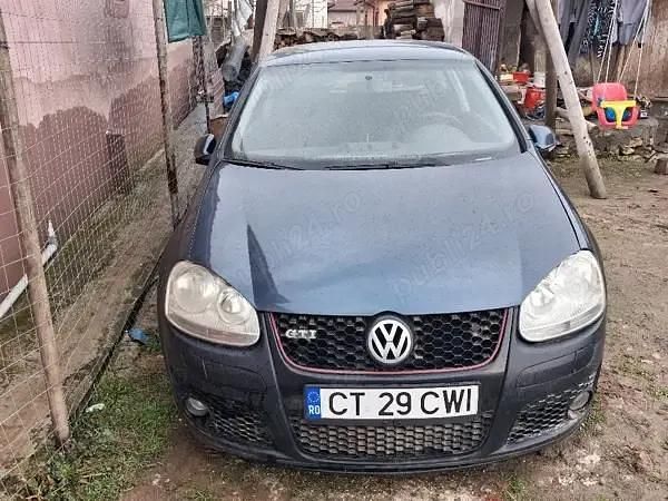 Second-hand VW Golf 74 CP (54 kW) 2005 Albastru Coupe