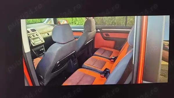 Second-hand VW Touran 140 CP (102 kW) 2008 Portocaliu Monovolum