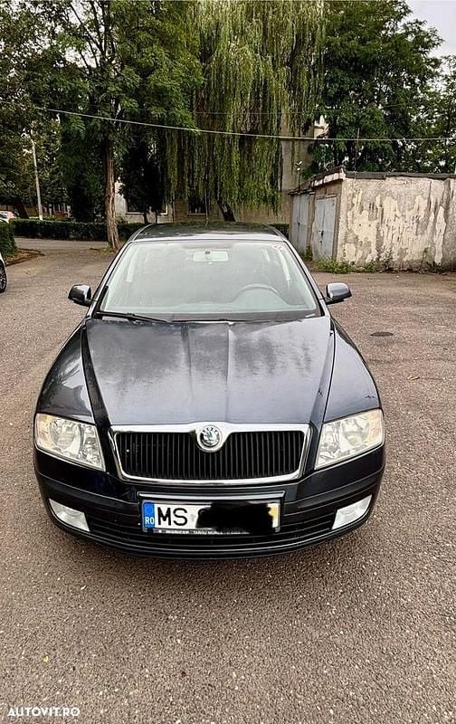 Culoaregri Utilizat 2008 Skoda Octavia Ambiente Break | 2.199 EUR (Preț bun) - Imagine 1/4