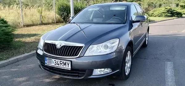 Gri Utilizat 2010 Skoda Octavia Elegance Berlinǎ | 4.390 EUR (Preț OK) - Imagine 1/4