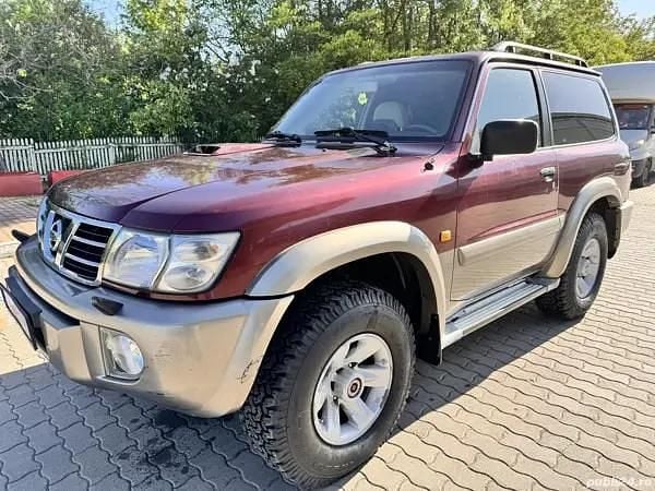 Rosu Utilizat 2003 Nissan Patrol SUV | 11.700 EUR - Imagine 1/4