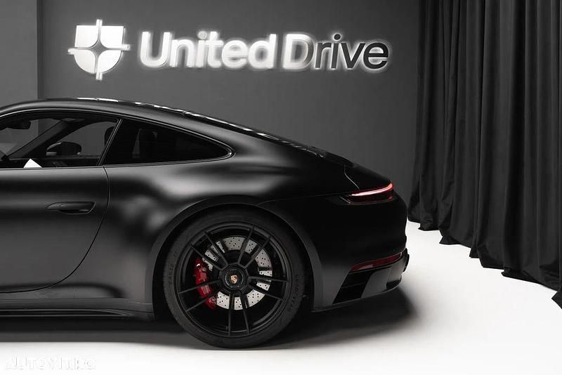 Second-hand Porsche 911 480 CP (353 kW) 2021 Culoarenegru Coupe