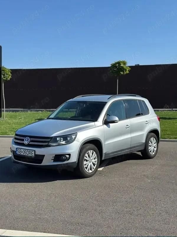 Second-hand VW Tiguan Sportline 163 CP (119 kW) 2011 Culoareargint SUV