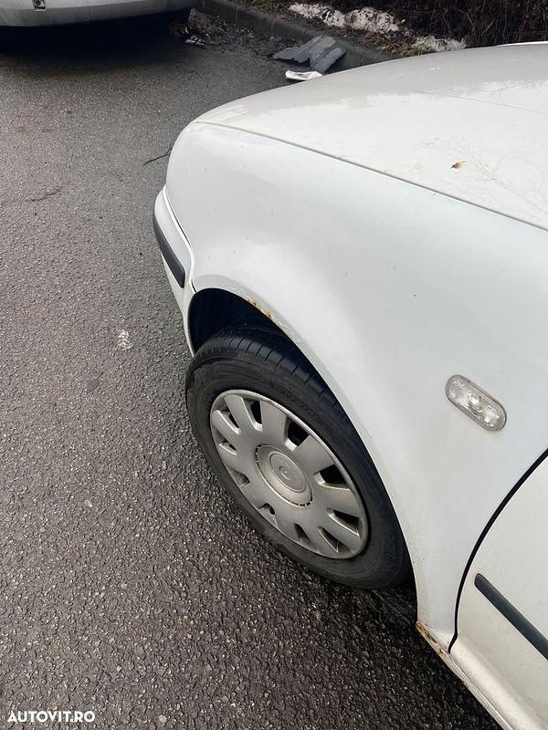 Second-hand VW Golf IV 90 CP (66 kW) 2001 Culoarealb Break