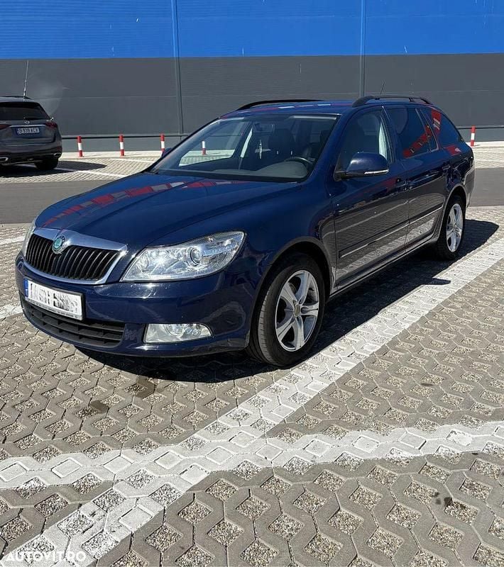 Culoarealbastru Utilizat 2012 Skoda Octavia Ambition Break | 4.650 EUR (Preț OK) - Imagine 1/4