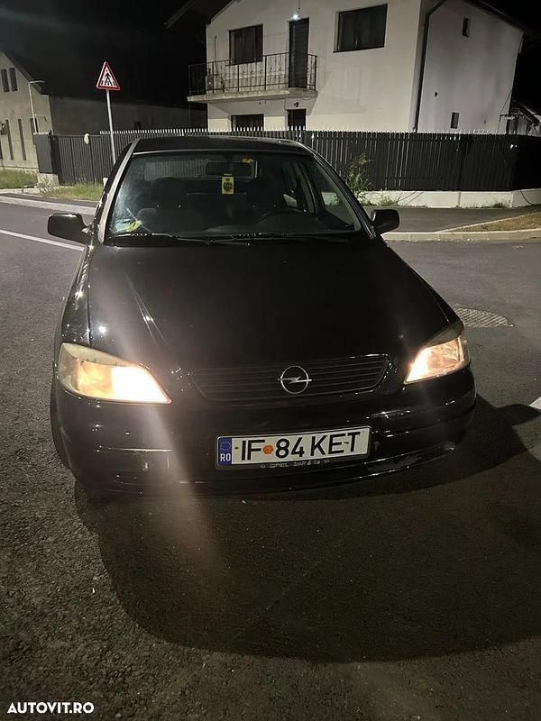 Negru Utilizat 2000 Opel Astra Berlinǎ | 900 EUR (Preț bun) - Imagine 1/3