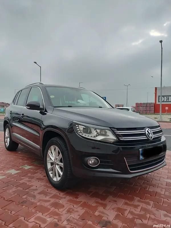 Culoarenegru Utilizat 2012 VW Tiguan SUV | 10.500 EUR (Preț OK) - Imagine 1/4