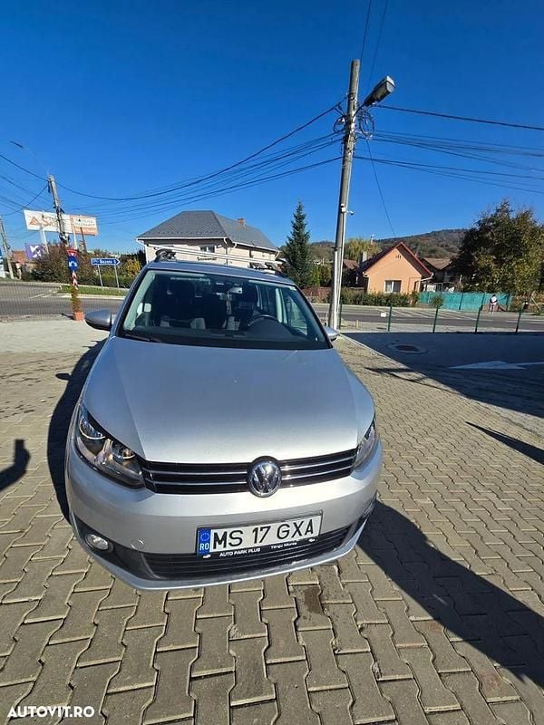 Second-hand VW Touran Comfortline 105 CP (77 kW) 2013 Culoareargint Monovolum