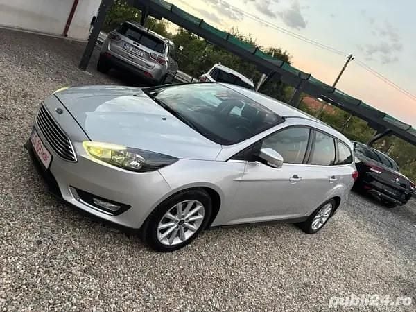 Gri Utilizat 2017 Ford Focus Break | 6.190 EUR (Preț OK) - Imagine 1/4