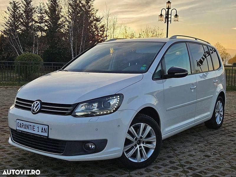 Second-hand VW Touran Style 105 CP (77 kW) 2011 Alb Monovolum