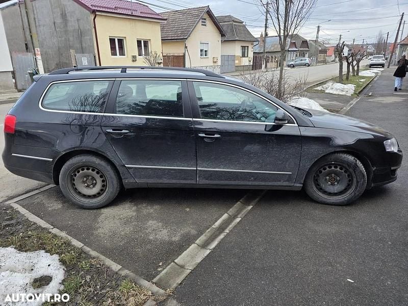 Culoarenegru Second-hand 2009 VW Passat Highline Break | 2.490 EUR (Preț bun) - Imagine 1/4