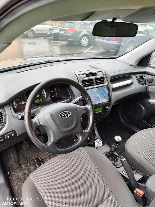 Gri Utilizat 2010 Kia Sportage SUV | 5.400 EUR (Preț OK) - Imagine 1/4