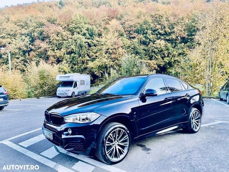 Culoarenegru Utilizat 2018 BMW X6 SUV | 33.999 EUR (Preț OK) - Imagine 1/4