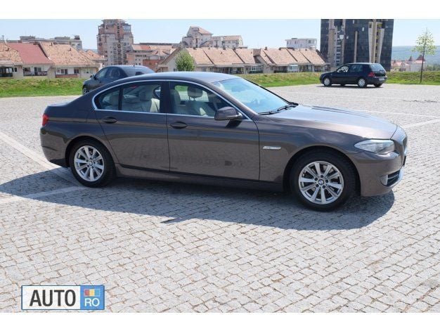 Second-hand BMW 520 Sport Line 170 CP (125 kW) 2012 Maro metalizat Berlinǎ