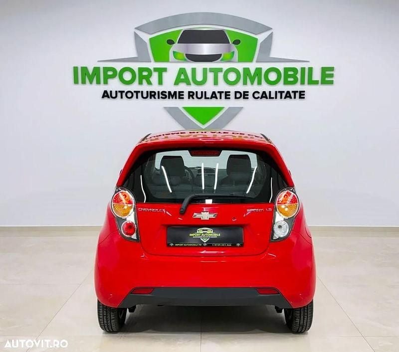 Second-hand Chevrolet Spark LS 68 CP (50 kW) 2011 Rosu Hatchback