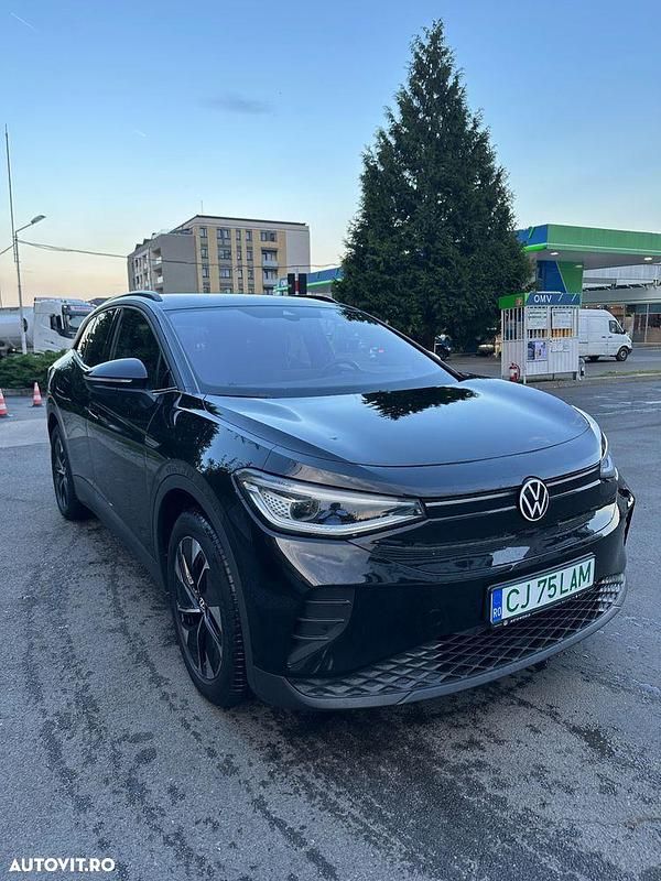 Culoarenegru Utilizat 2022 VW ID.4 SUV | 27.000 EUR (Preț bun) - Imagine 1/4