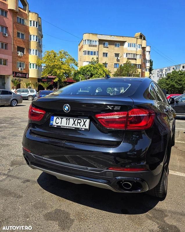 Second-hand BMW X6 Comfort Edition 258 CP (189 kW) 2014 Culoarenegru SUV