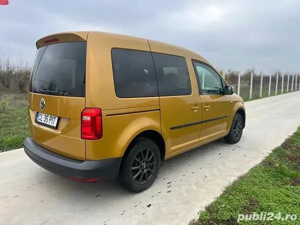 Second-hand VW Caddy 75 CP (55 kW) 2018 Galben Monovolum