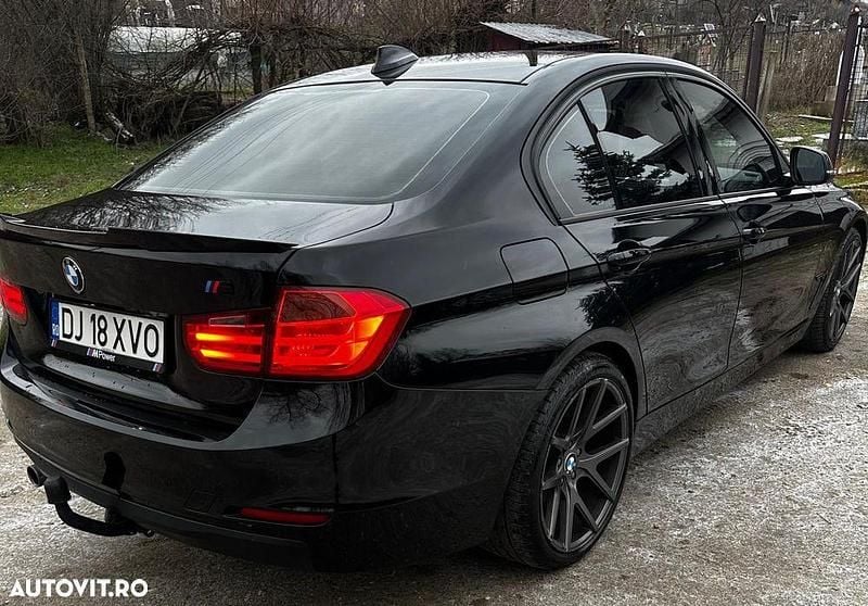Culoarenegru Second-hand 2014 BMW 316 Sport Line Berlinǎ | 8.900 EUR (Preț bun) - Imagine 1/4