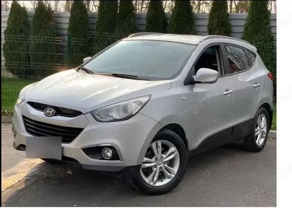 Gri Utilizat 2010 Hyundai ix35 Classic SUV | 6.990 EUR (Preț OK) - Imagine 1/4