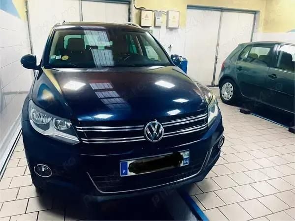 Albastru Utilizat 2013 VW Tiguan SUV | 8.900 EUR (Preț OK) - Imagine 1/4