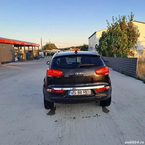 Negru Utilizat 2014 Kia Sportage SUV | 8.900 EUR (Preț bun) - Imagine 1/4