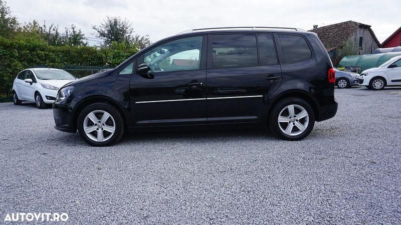 Second-hand VW Touran Comfortline 140 CP (102 kW) 2014 Culoarenegru Monovolum
