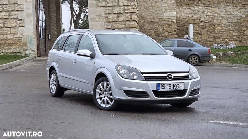 Culoareargint Utilizat 2007 Opel Astra Comfort Break | 1.999 EUR (Preț bun) - Imagine 1/4