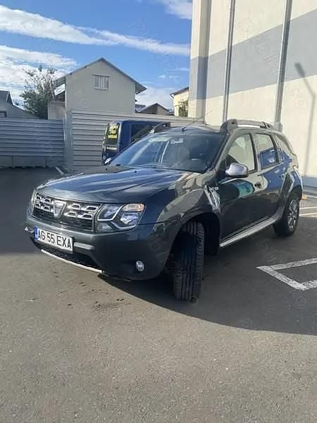 Gri Utilizat 2015 Dacia Duster SUV | 8.399 EUR (Puțin scump) - Imagine 1/4