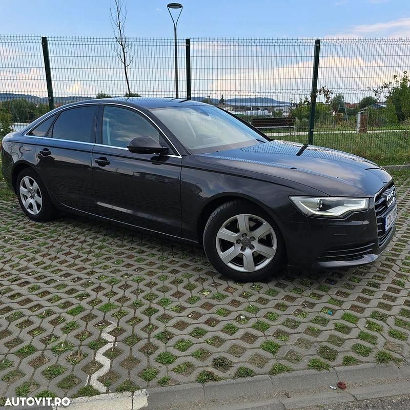 Culoarenegru Utilizat 2012 Audi A6 Sport Break | 12.800 EUR (Scump) - Imagine 1/4