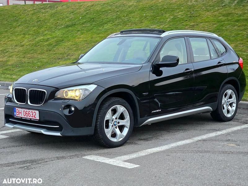 Culoarenegru Utilizat 2011 BMW X1 xLine SUV | 6.999 EUR (Preț bun) - Imagine 1/4
