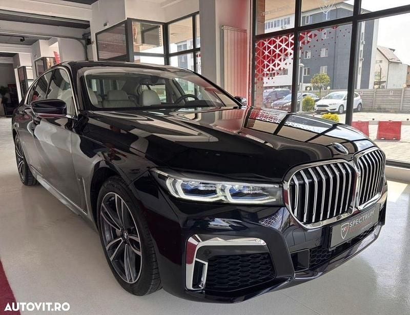 Culoarenegru Utilizat 2021 BMW 745e Comfort Edition Berlinǎ | 53.800 EUR (Preț OK) - Imagine 1/4