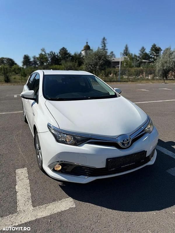 Culoarealb Utilizat 2016 Toyota Auris Hybrid Luna Berlinǎ | 10.999 EUR - Imagine 1/4