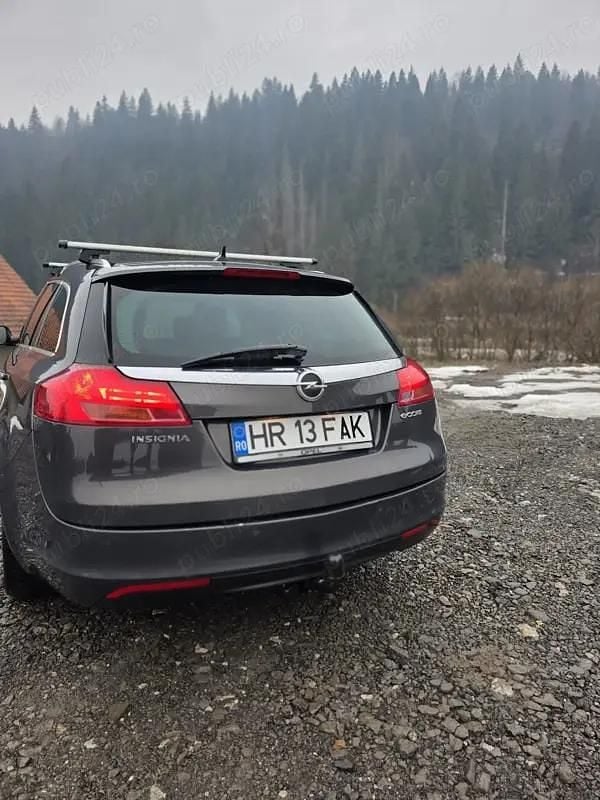 Second-hand Opel Insignia 160 CP (117 kW) 2013 Hatchback