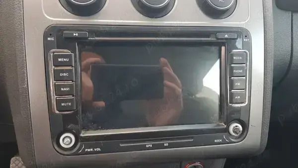 Second-hand VW Touran 105 CP (77 kW) 2009 Gri Monovolum