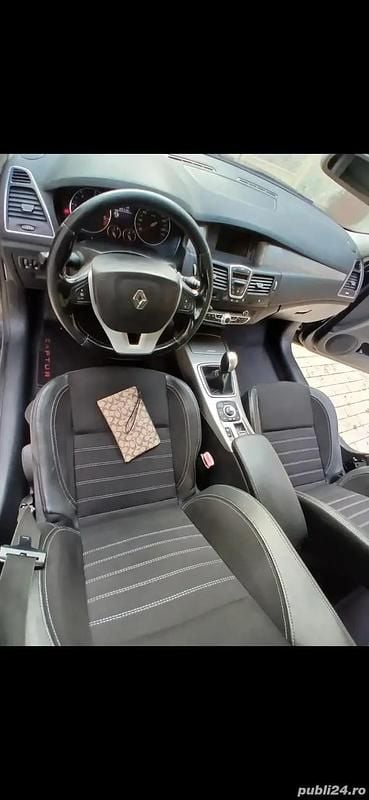 Second-hand Renault Laguna III 130 CP (95 kW) 2012 Hatchback